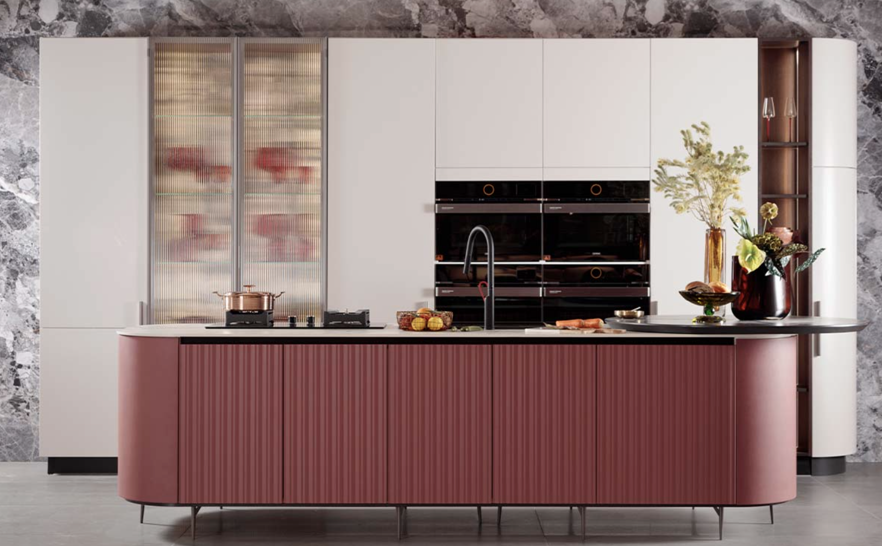 Contemporary kitchen with curved dark red island